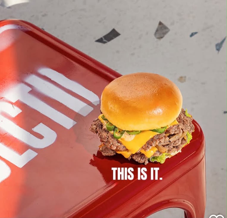 Double SLCTD burger on a red SLCTD stool — this is it