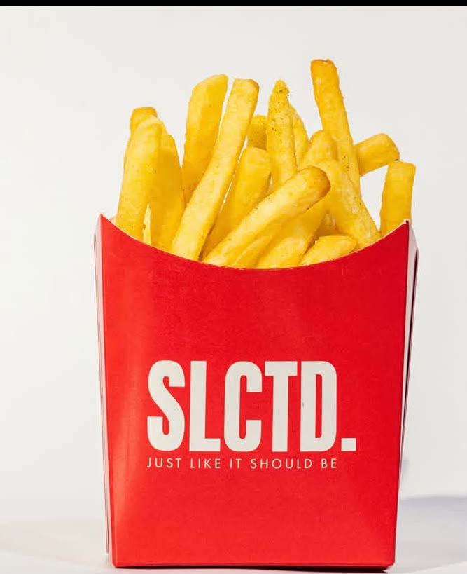 SLCTD french fries in the red branded box
