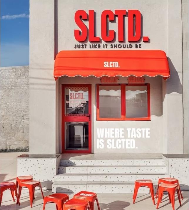 SLCTD. storefront — red awning, Amman